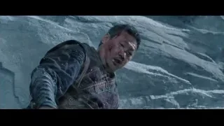 Battle-worn man by rock formation — Doctor Strange 2