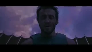injured man standing under cloudy sky — Gladiator 2