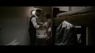 man and woman looking at paper — The Persuit of Happyness