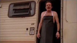man in apron standing in trailer doorway — Breaking Bad