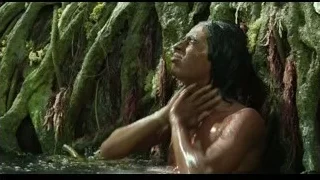 Man sitting in cave water — Life of Pi