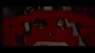 person peeking from behind red chair — Bruce Lee: Enter The Dragon