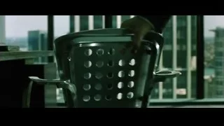 person's hand on office chair with city view — The Matrix