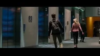 two men walking down modern corridor — The Amazing Spider Man 2